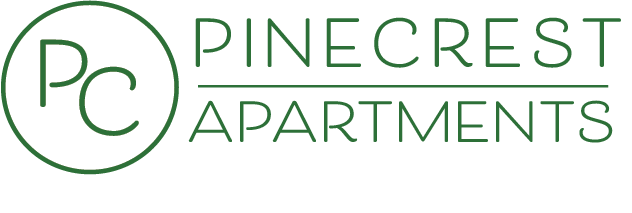 The image is a logo for Pinecrest Apartments.